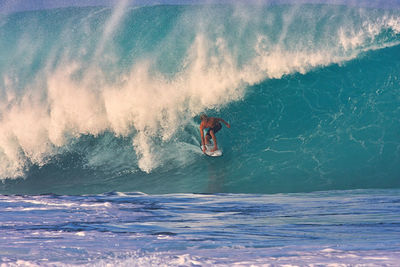 Man surfing in sea