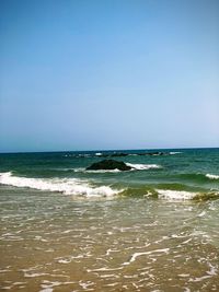 Scenic view of sea against clear sky