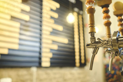 Row of draft beer taps at a bar. beer taps in a row in perspective. close up of beer tap. 