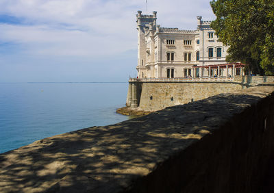 View of historical building against cloudy sky