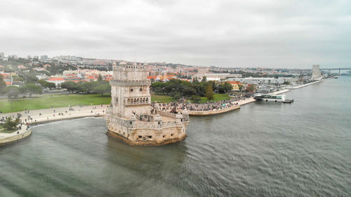 High angle view of bridge over river against buildings