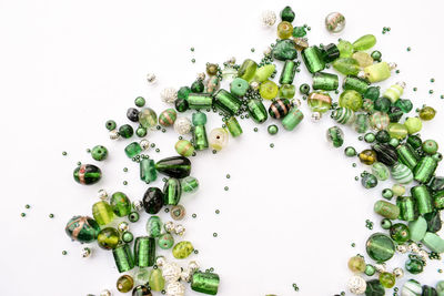 High angle view of vegetables on table against white background