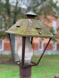 Close-up of birdhouse on tree in park