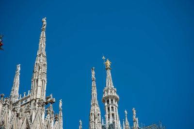 Low angle view of traditional building against clear blue sky