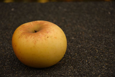 Close-up of apple on table