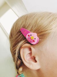 Close-up of girl wearing hair clip