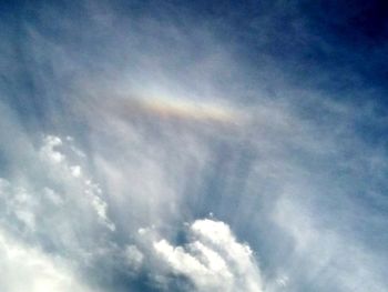 Low angle view of rainbow in sky