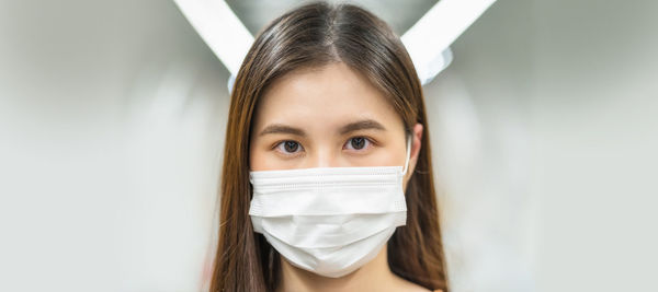 Portrait of woman wearing mask