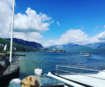 View of swimming pool in sea against cloudy sky