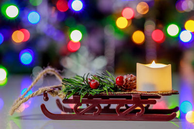 Close-up of christmas decorations on table