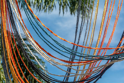 Low angle view of metallic structure against sky