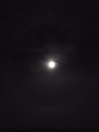 Low angle view of moon in sky at night