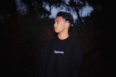 Portrait of a young man looking away