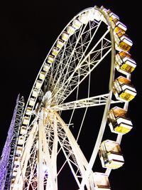 Low angle view of ferris wheel