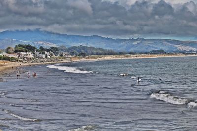Scenic view of sea against cloudy sky