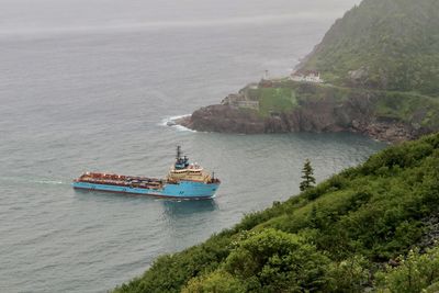 High angle view of ship sailing on sea