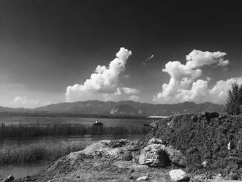 Scenic view of agricultural landscape against sky