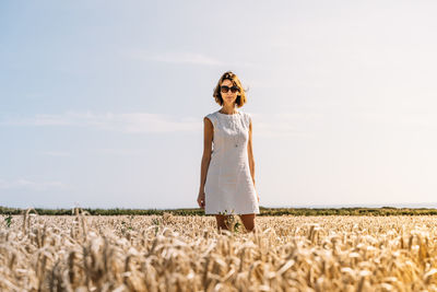 Summer concept, caucasian middle-aged woman in the countryside