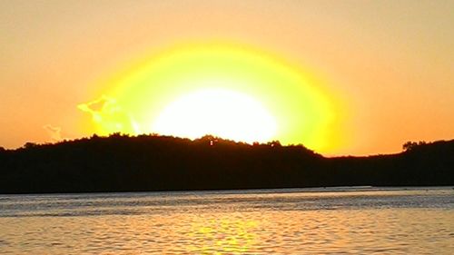 Scenic view of sunset over sea