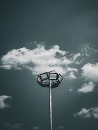 Low angle view of floodlight against sky