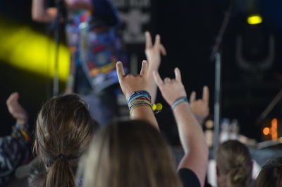 People enjoying music concert