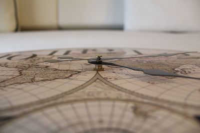 Close-up of world map clock