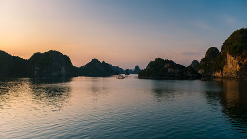 Scenic view of sea against sky at sunset