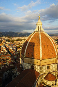 High angle view of cathedral against cloudy sky