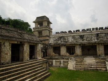 Old ruin building against cloudy sky