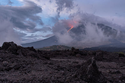 Scenic view of volcanic mountain against sky and pacaya volcano