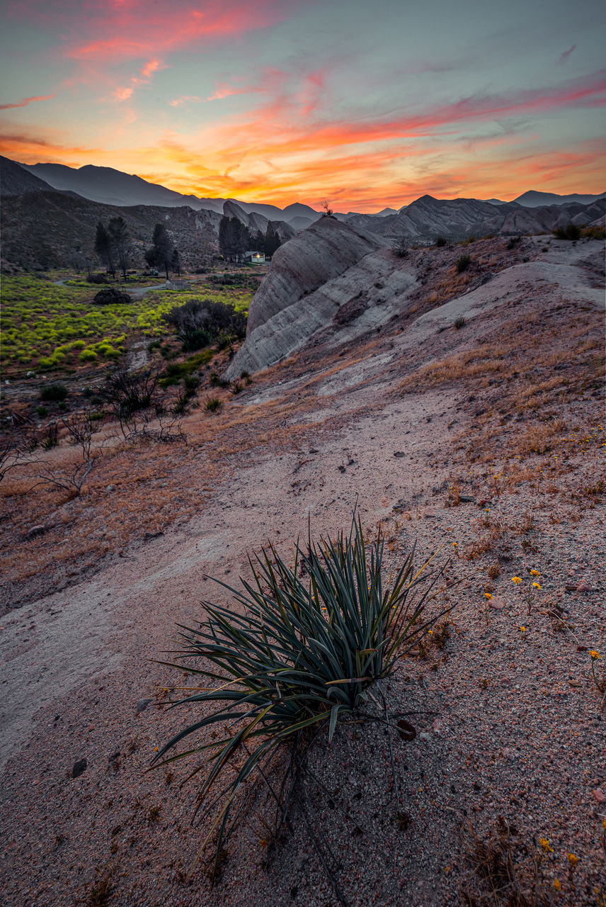 beauty in nature, scenics - nature, mountain, tranquility, tranquil scene, cloud - sky, nature, rock, solid, sky, sunset, non-urban scene, no people, rock - object, land, environment, mountain range, rock formation, landscape, physical geography, outdoors, formation, arid climate, eroded