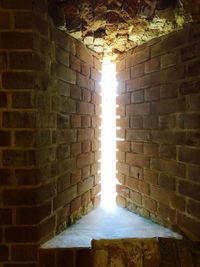 Sunlight falling on illuminated wall