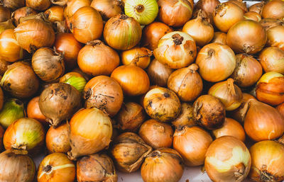 Full frame shot of onions for sale at market