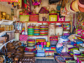 Multi colored toys for sale at market stall