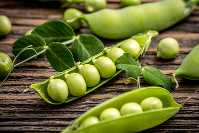 Close-up of green peas on table