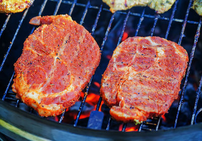 Close-up of meat on grill