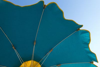 Low angle view of red umbrella