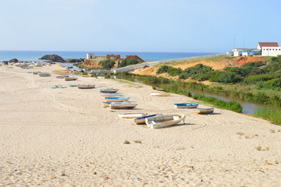 Scenic view of beach against clear sky