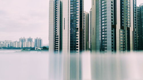 Modern cityscape against sky