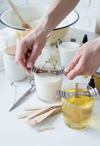 Midsection of man preparing food on table