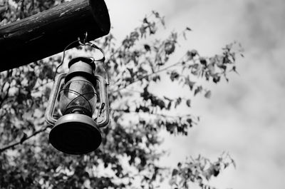 Low angle view of street light against sky