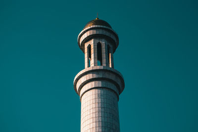 Low angle view of building against blue sky