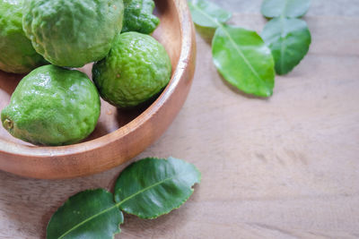 High angle view of green fruits on table