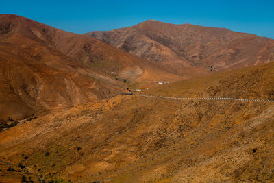 Scenic view of mountains against clear sky