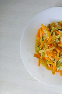 High angle view of chopped vegetables in bowl on table