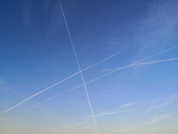 Low angle view of vapor trail in sky