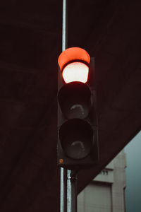 Low angle view of illuminated lamp