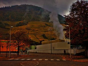 View of factory against mountain