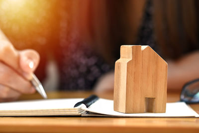 Close-up of hand holding book