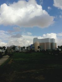 Buildings in city against sky